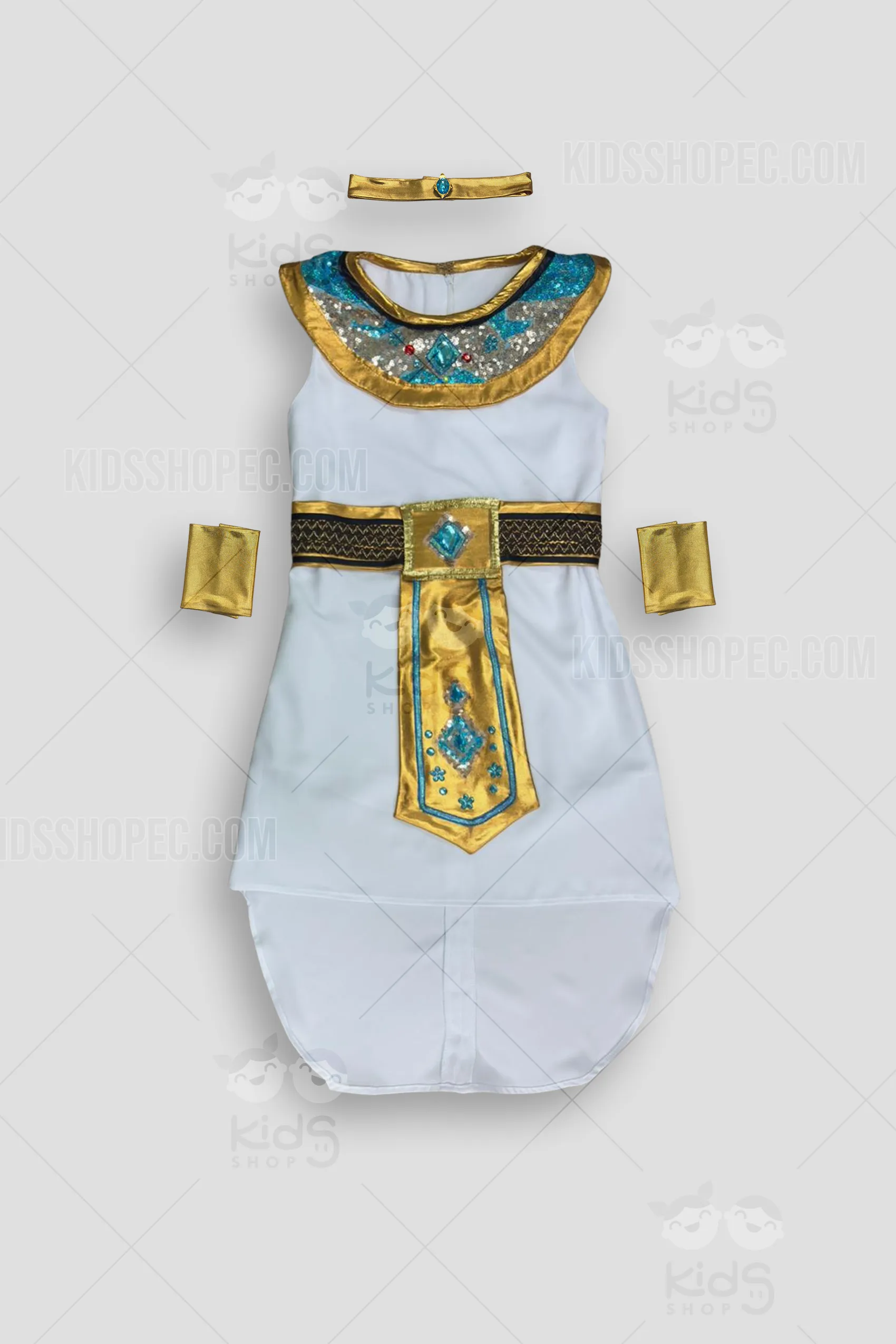 Vestido blanco de Cleopatra para niña con corte asimétrico y acabados satinados. Incluye collar de lentejuelas turquesa, cinturón dorado con gemas y accesorios coordinados (diadema y brazaletes dorados). Confección artesanal por Kids Shop EC Quito.