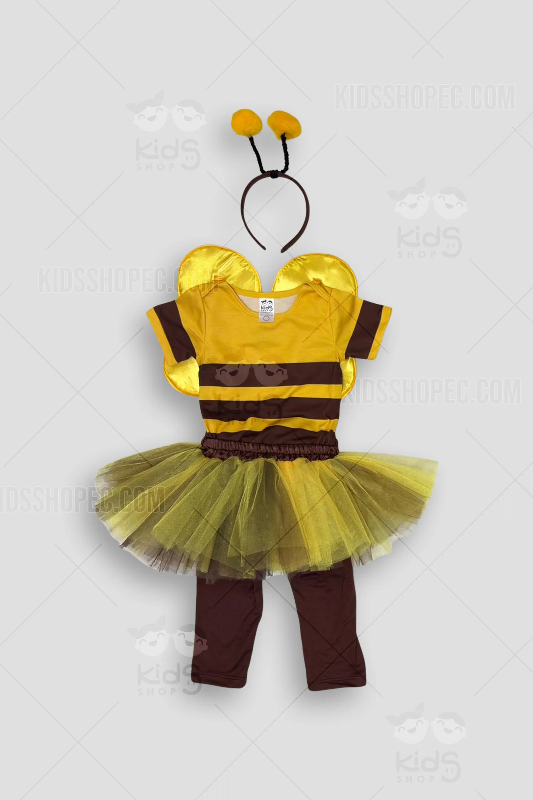 Set de disfraz de abeja para niña en color amarillo y café. Incluye body a rayas, pantalón café, falda de tutú bicolor, alas amarillas con puntos negros y brillantes, y diadema con pompones. Confección artesanal de Kids Shop EC.
